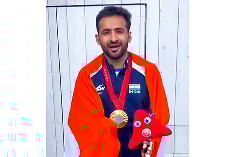 2024 Paris Paralympics: Para-badminton player Kumar Nitesh poses for photos after winning the gold medal in the men's singles SL3 badminton event